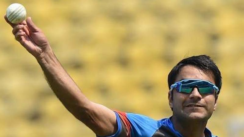 Known to fox the batsmen with his googly and accurate quicker ones, Rashid Khan, who is among the many die-hard Bollywood fans in Afghanistan, has modelled himself on Pakistan star Shahid Afridi and favourite Indian player is none other than MS Dhoni. (Photo: AFP) Known to fox the batsmen with his googly and accurate quicker ones, Rashid Khan, who is among the many die-hard Bollywood fans in Afghanistan, has modelled himself on Pakistan star Shahid Afridi and favourite Indian player is none other than MS Dhoni. (Photo: AFP)