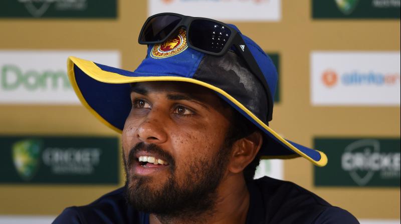 Sri Lanka Cricket says on Tuesday opening batsman Dimuth Karunaratne is the stand-in captain of a 17-man squad for the two-test series starting on Feb. 13. (Photo: AFP) Sri Lanka Cricket says on Tuesday opening batsman Dimuth Karunaratne is the stand-in captain of a 17-man squad for the two-test series starting on Feb. 13. (Photo: AFP)