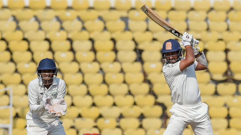 Pujara played for the turn only to be adjudged leg before as Sarwate bowled an arm ball. (Photo: PTI) Pujara played for the turn only to be adjudged leg before as Sarwate bowled an arm ball. (Photo: PTI)
