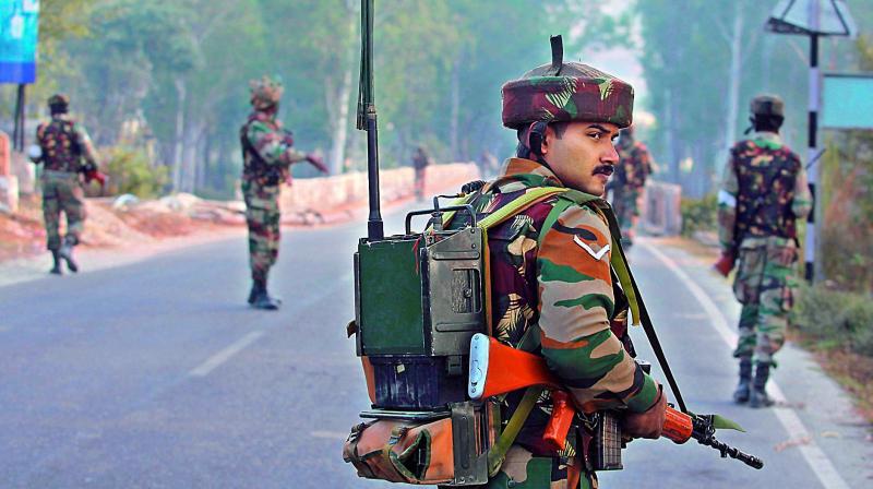 Soldiers patrol on the Jammu-Srinigar National Highway after the Nagrota attack. (Photo: PTI) Soldiers patrol on the Jammu-Srinigar National Highway after the Nagrota attack. (Photo: PTI)