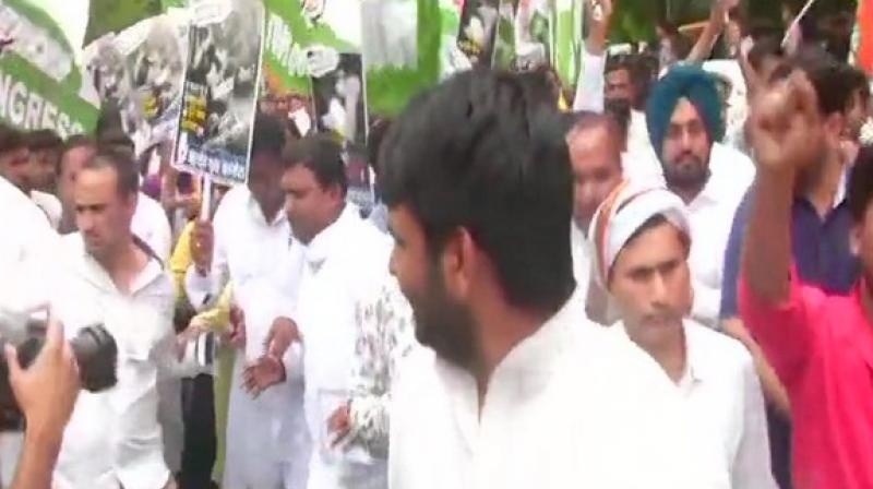 Demanding the resignations of Harsh Vardhan and Bihar Chief Minister Nitish Kumar, the protesters chanted anti-government slogans. (Photo: ANI) Demanding the resignations of Harsh Vardhan and Bihar Chief Minister Nitish Kumar, the protesters chanted anti-government slogans. (Photo: ANI)