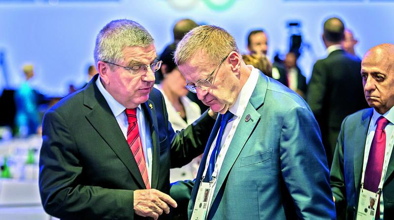 International Olympic Committee President Thomas Bach (left) speaks with Australian IOC member John Coates during the 134th Session of the International Olympic Committee in Lausanne. (Photo: AP) International Olympic Committee President Thomas Bach (left) speaks with Australian IOC member John Coates during the 134th Session of the International Olympic Committee in Lausanne. (Photo: AP)