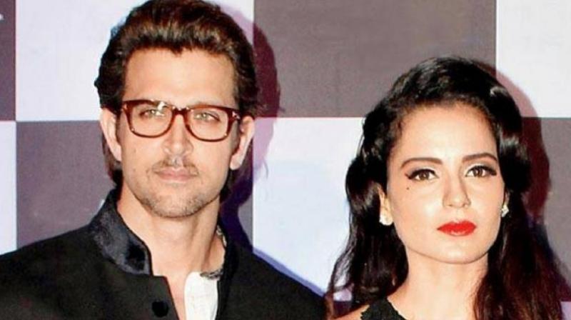 Hrithik Roshan and Kangana Ranaut at an event. Hrithik Roshan and Kangana Ranaut at an event.