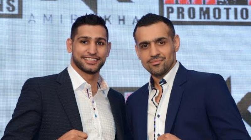 Bill Dosanjh (right) hopes to follow the Formula One model, in his efforts to grow MMA in the world. Bill Dosanjh (right) hopes to follow the Formula One model, in his efforts to grow MMA in the world.