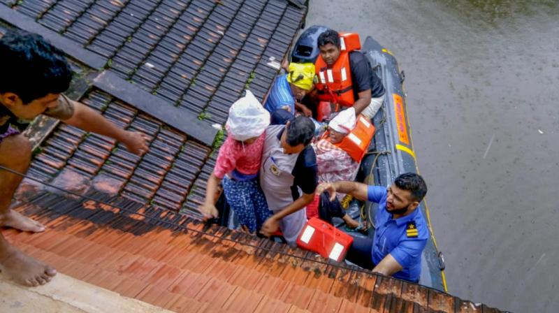 Rescue teams evacuate people from flood affected areas, to relief camps at Kottayam district in Kerala on Monday. (Photo: PTI) Rescue teams evacuate people from flood affected areas, to relief camps at Kottayam district in Kerala on Monday. (Photo: PTI)