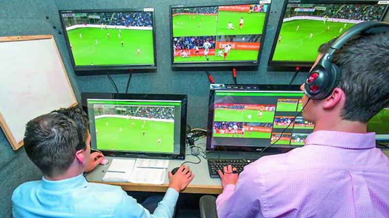Video Assistant Referee and his team monitoring the match. Video Assistant Referee and his team monitoring the match.