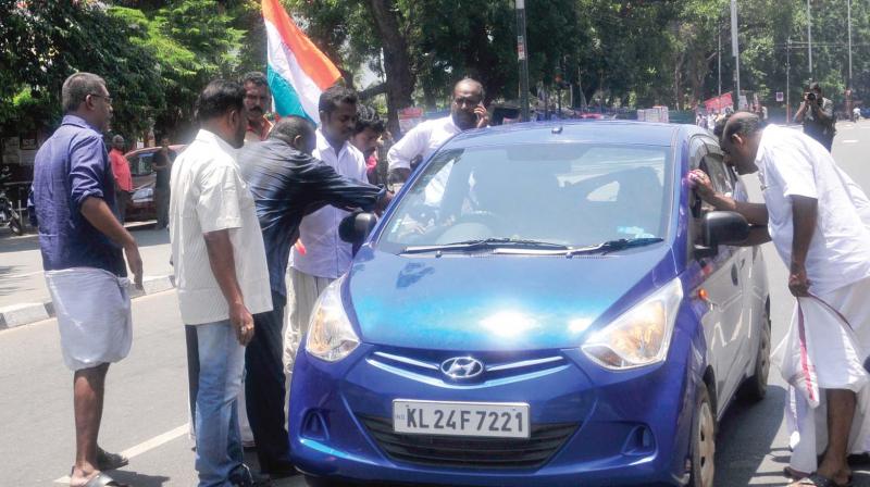 Congress workers block a private vehicle in front the secretariat in Thiruvananthapuram on Monday. (Photo: A.V. MUZAFAR) Congress workers block a private vehicle in front the secretariat in Thiruvananthapuram on Monday. (Photo: A.V. MUZAFAR)