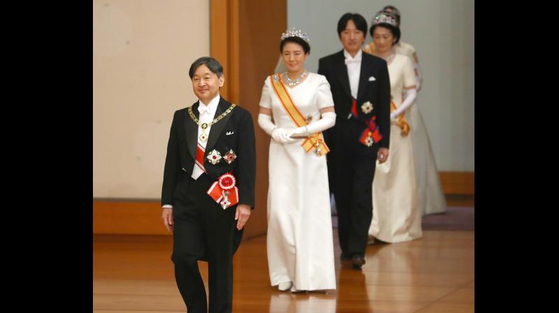 The sole woman invitee was the only female member of Prime Minister Shinzo Abe's cabinet. (Photo:AP) The sole woman invitee was the only female member of Prime Minister Shinzo Abe's cabinet. (Photo:AP)
