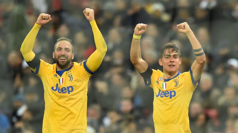Juventus staged a stunning fightback against Tottenham to reach the Champions League quarter-finals 4-3 on aggregate after Paulo Dybala and Gonzalo Higuain sealed a dramatic 2-1 win in the last 16 second leg. (Photo: AFP) Juventus staged a stunning fightback against Tottenham to reach the Champions League quarter-finals 4-3 on aggregate after Paulo Dybala and Gonzalo Higuain sealed a dramatic 2-1 win in the last 16 second leg. (Photo: AFP)