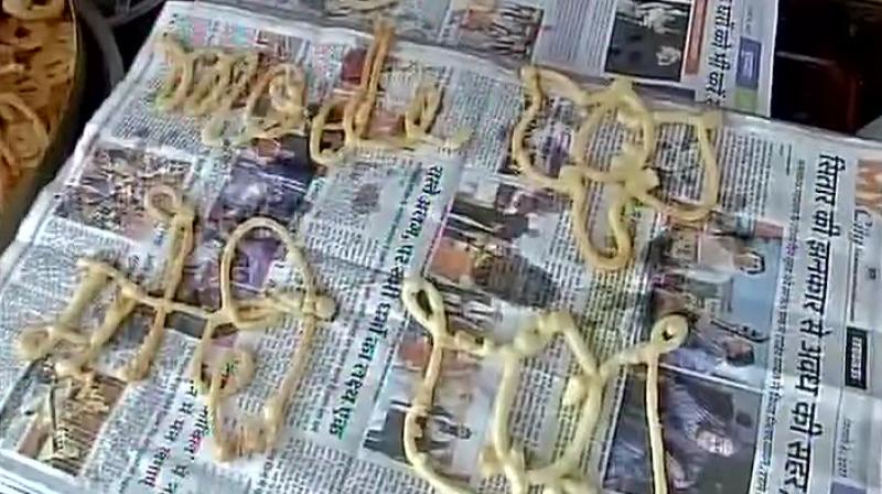 Suresh Sahu, who is the owner of a sweet shop, sells the ' Modi Jalebi' free of cost in a bid to woo customers. (Photo: File) Suresh Sahu, who is the owner of a sweet shop, sells the ' Modi Jalebi' free of cost in a bid to woo customers. (Photo: File)