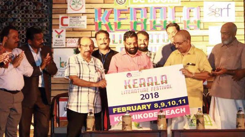 Tourism Minister Kadakampally Surendran launches the logo of 2018 Kerala Literature Fest at the valedictory ceremony at Kozhikode Beach on Sunday. KLF Director K. Satchidanandan, Kozhikode North MLA A. Pradeep Kumar among others look on. (Photo: DC) Tourism Minister Kadakampally Surendran launches the logo of 2018 Kerala Literature Fest at the valedictory ceremony at Kozhikode Beach on Sunday. KLF Director K. Satchidanandan, Kozhikode North MLA A. Pradeep Kumar among others look on. (Photo: DC)