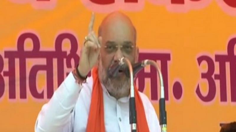 Shah said, "Indian Overseas Congress chief Sam Pitroda says that we should not attack terror camps at Pakistan and advised us to hold talks with Pakistan. (Photo: ANI twitter) Shah said, "Indian Overseas Congress chief Sam Pitroda says that we should not attack terror camps at Pakistan and advised us to hold talks with Pakistan. (Photo: ANI twitter)