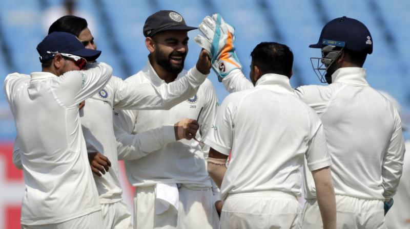 Virat Kohli-led India dominated the game, amassing 649 for nine in their first innings before bowling out the West Indies twice on day three, to take a 1-0 lead in the two-match series. (Photo: AP) Virat Kohli-led India dominated the game, amassing 649 for nine in their first innings before bowling out the West Indies twice on day three, to take a 1-0 lead in the two-match series. (Photo: AP)