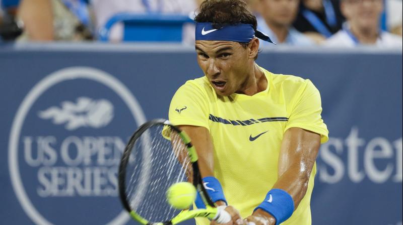 Nadal sat out an hour-long rain delay before beating Richard Gasquet finishing it off with two of his eight aces. (Photo: AP) Nadal sat out an hour-long rain delay before beating Richard Gasquet finishing it off with two of his eight aces. (Photo: AP)