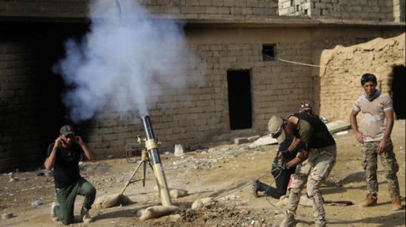 Iraqi army soldiers fire mortars against the Islamic State militants, at Shahrazad village 2 miles (3 kilometers) east of Mosul, Iraq. (Photo: AP) Iraqi army soldiers fire mortars against the Islamic State militants, at Shahrazad village 2 miles (3 kilometers) east of Mosul, Iraq. (Photo: AP)