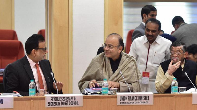 Revenue Secretary Hasmukh Adhia with Finance Minister Arun Jaitley. (Photo: PTI) Revenue Secretary Hasmukh Adhia with Finance Minister Arun Jaitley. (Photo: PTI)