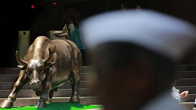 At the Bombay Stock Exchnage (BSE) market players followed instinct as bargain hunting in recently beaten down shares. (Photo: AP) At the Bombay Stock Exchnage (BSE) market players followed instinct as bargain hunting in recently beaten down shares. (Photo: AP)