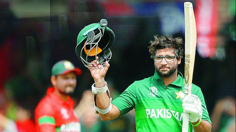 Pakistan's Imam-ul-Haq celebrates his century against Bangladesh at Lord’s cricket ground in London on Friday. (Photo: AP) Pakistan's Imam-ul-Haq celebrates his century against Bangladesh at Lord’s cricket ground in London on Friday. (Photo: AP)
