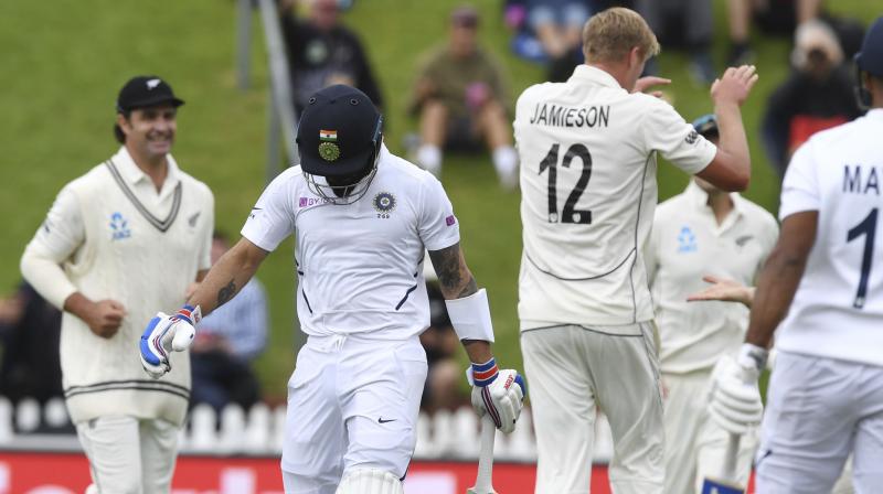 The towering Kyle Jamieson had a dream Test debut for New Zealand with three wickets, including the prized scalp of Virat Kohli, winning glowing praise from India on day one of the first Test in Wellington on Friday. (Photo:AFP)