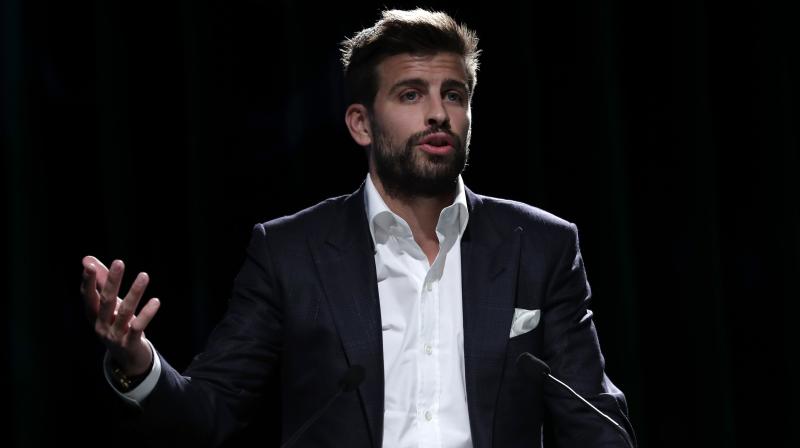 Barcelona defender Pique is the president and founder of Kosmos, the company promoting the new Davis Cup competition. (Photo: AP) Barcelona defender Pique is the president and founder of Kosmos, the company promoting the new Davis Cup competition. (Photo: AP)