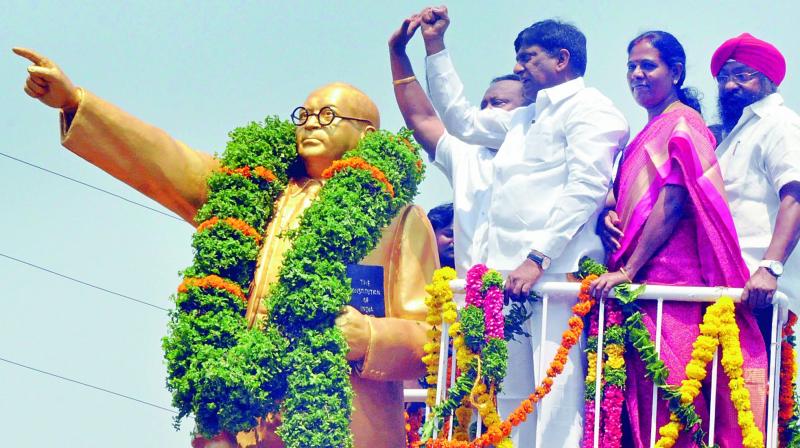 MP B. Vinod Kumar and ZP chairperson Thula Uma, MLA Gangula Kamalakar, Municipal Corporation mayor S. Ravinder Singh pay tributes at the statue of Dr B.R. Ambedkar to mark his birth anniversary in Karimnagar on Friday. (Photo: DC) MP B. Vinod Kumar and ZP chairperson Thula Uma, MLA Gangula Kamalakar, Municipal Corporation mayor S. Ravinder Singh pay tributes at the statue of Dr B.R. Ambedkar to mark his birth anniversary in Karimnagar on Friday. (Photo: DC)