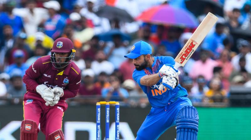 Opener Rohit Sharma along with his skipper Virat Kohli frustrated the West Indian bowling unit with their 28-run stand. (Photo:AFP) Opener Rohit Sharma along with his skipper Virat Kohli frustrated the West Indian bowling unit with their 28-run stand. (Photo:AFP)