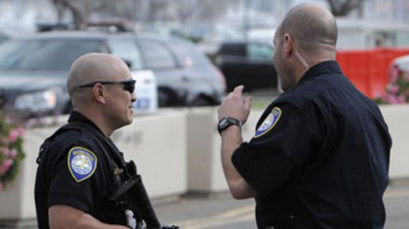 Police say officers were trying to arrest one of the males on a warrant when the scuffle broke out in the parking lot of the Tequila Bar Y Grill. (Photo: Representational Image/AFP) Police say officers were trying to arrest one of the males on a warrant when the scuffle broke out in the parking lot of the Tequila Bar Y Grill. (Photo: Representational Image/AFP)