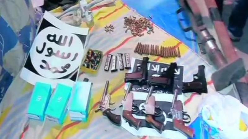 According to NIA, a locally-made rocket launcher, material for suicide vests and 112 alarm clocks to be used as timers were recovered from the searches. (Photo: ANI) According to NIA, a locally-made rocket launcher, material for suicide vests and 112 alarm clocks to be used as timers were recovered from the searches. (Photo: ANI)