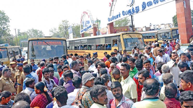 Over 300 people blocked the road at the Periyar bus stand, Madurai, on Saturday in protest against bus fare hike. With traffic affected for nearly an hour, the police tried to disperse the crowd but the protesters resisted. Police took five persons into custody and had to literally drag them to the police van. The situation came under control after this (Photo: K .Manikandan) Over 300 people blocked the road at the Periyar bus stand, Madurai, on Saturday in protest against bus fare hike. With traffic affected for nearly an hour, the police tried to disperse the crowd but the protesters resisted. Police took five persons into custody and had to literally drag them to the police van. The situation came under control after this (Photo: K .Manikandan)