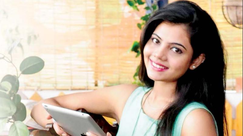 A file photograph of a girl busy on her i-Pad used for representative purposes only. A file photograph of a girl busy on her i-Pad used for representative purposes only.