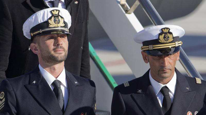File photo of Italian marines Salvatore Girone, left, and Massimiliano Latorre, arriving at the Ciampino Rome airport from Kochi, India. AP Photo File photo of Italian marines Salvatore Girone, left, and Massimiliano Latorre, arriving at the Ciampino Rome airport from Kochi, India. AP Photo