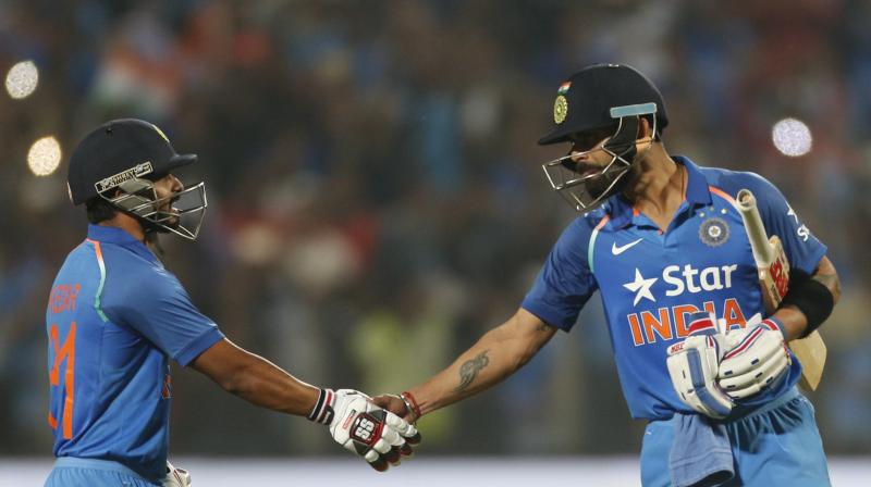 Kedar Jadhav and Virat Kohli played a crucial role, putting up a 200-run partnership, to chase down the mammoth total of 351 set by England in Pune. (Photo: AP) Kedar Jadhav and Virat Kohli played a crucial role, putting up a 200-run partnership, to chase down the mammoth total of 351 set by England in Pune. (Photo: AP)