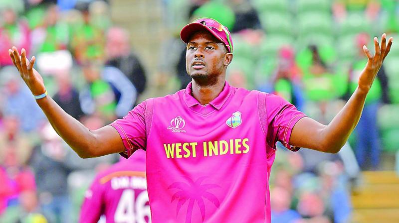 Jason Holder in this file photo. -- Twitter Jason Holder in this file photo. -- Twitter