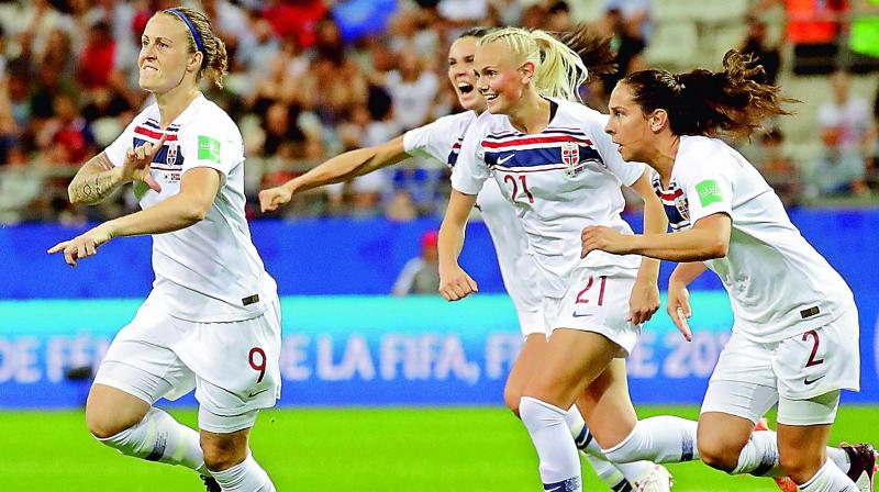 Norway’s Isabell Herlovsen (left) celebrates with teammates after scoring in a Women’s World Cup match against South Korea at the Stade Auguste-Delaune in Reims, France, on Tuesday. Norway won 2-1. (Photo: AP) Norway’s Isabell Herlovsen (left) celebrates with teammates after scoring in a Women’s World Cup match against South Korea at the Stade Auguste-Delaune in Reims, France, on Tuesday. Norway won 2-1. (Photo: AP)
