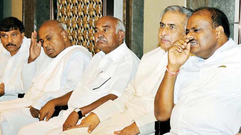 A file photo of JD(S) leader A.H. Vishwanath (centre) with party leaders H.D. Deve Gowda and Basavaraj Horatti A file photo of JD(S) leader A.H. Vishwanath (centre) with party leaders H.D. Deve Gowda and Basavaraj Horatti