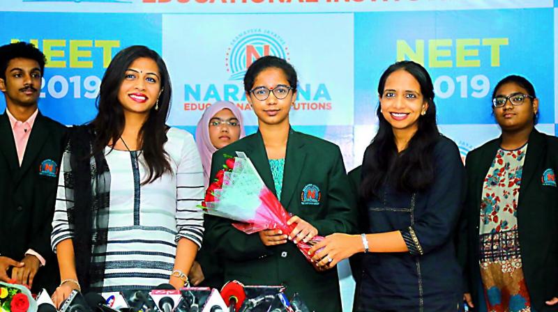 Madhapur resident G. Madhuri Reddy, who secured the all-India 7th rank, is being congratulated for her result on Thursday. Madhapur resident G. Madhuri Reddy, who secured the all-India 7th rank, is being congratulated for her result on Thursday.