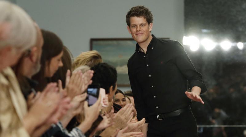 Creative Director Wes Gordon acknowledges audience applause after the Carolina Herrera spring 2019 collection was modeled during Fashion Week in New York, Monday, Sept. 10, 2018.(Photo: AP) Creative Director Wes Gordon acknowledges audience applause after the Carolina Herrera spring 2019 collection was modeled during Fashion Week in New York, Monday, Sept. 10, 2018.(Photo: AP)