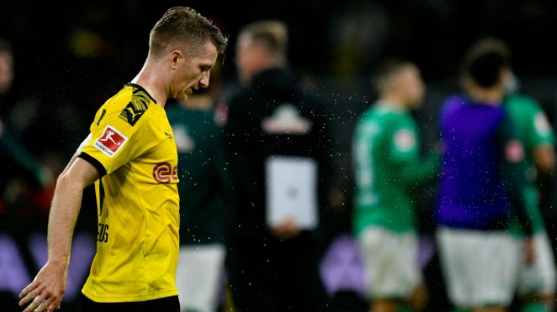 Marco Reus shows his disappointment after Dortmund drew another game in a row. (Photo:AFP) Marco Reus shows his disappointment after Dortmund drew another game in a row. (Photo:AFP)