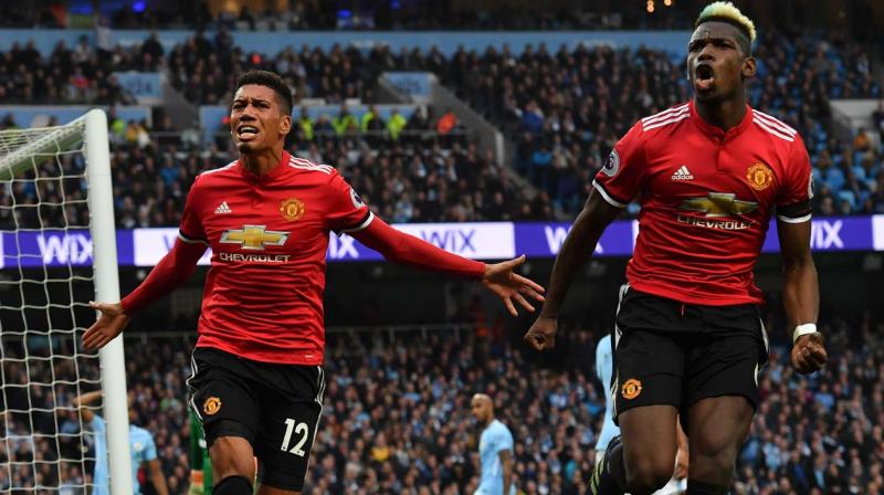 And United took just 16 minutes to complete an incredible turnaround when Smalling capitalised on some slack City marking to turn home Sanchez's free-kick. (Photo: AFP) And United took just 16 minutes to complete an incredible turnaround when Smalling capitalised on some slack City marking to turn home Sanchez's free-kick. (Photo: AFP)