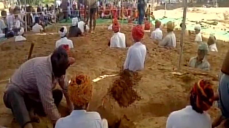 Farmers whose lands have been appropriated for the KSEZ have already been agitating against the KSEZ and have taken the state government and the management of KSEZ to court (Photo: ANI) Farmers whose lands have been appropriated for the KSEZ have already been agitating against the KSEZ and have taken the state government and the management of KSEZ to court (Photo: ANI)