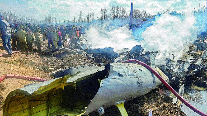 Wreckage of the MI-17 copter that crashed in Budgam district of Jammu and Kashmir on Wednesday. (Photo: AP) Wreckage of the MI-17 copter that crashed in Budgam district of Jammu and Kashmir on Wednesday. (Photo: AP)