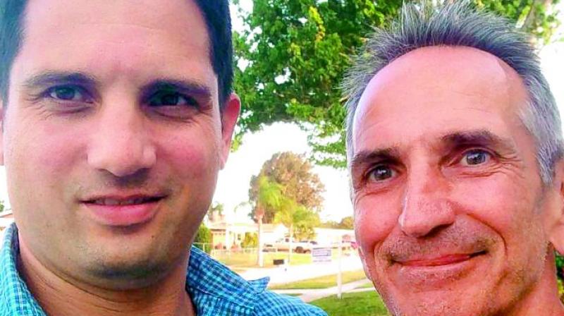 Jon O’Neill, right, poses with World War II historian Justin Taylan for a selfie in De Land, Fla. The photo was shared by Justin Taylan a year ago. (Photo: Agencies) Jon O’Neill, right, poses with World War II historian Justin Taylan for a selfie in De Land, Fla. The photo was shared by Justin Taylan a year ago. (Photo: Agencies)