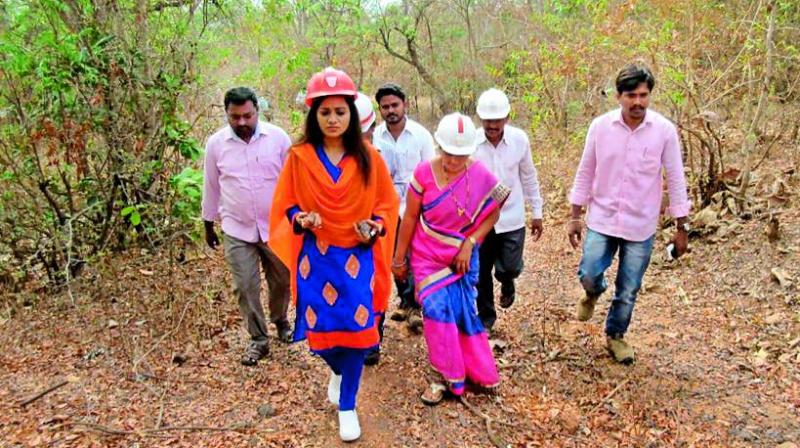 Reshma Rathore inspects the iron ore in Bayyaram forest area. Reshma Rathore inspects the iron ore in Bayyaram forest area.