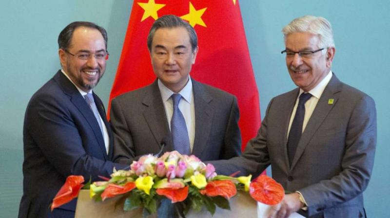 (From left) Afghanistan foreign minister Salahuddin Rabbani, Chinese foreign minister Wang Yi and Pakistani foreign minister Khawaja Asif at press conference for the 1st China-Afghanistan-Pakistan Foreign Ministers' Dialogue in Beijing on December 26, 2017. (Photo: AP) (From left) Afghanistan foreign minister Salahuddin Rabbani, Chinese foreign minister Wang Yi and Pakistani foreign minister Khawaja Asif at press conference for the 1st China-Afghanistan-Pakistan Foreign Ministers' Dialogue in Beijing on December 26, 2017. (Photo: AP)