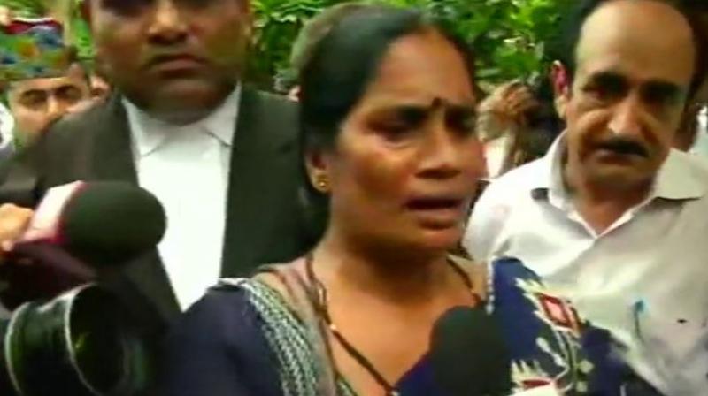 'This decision reaffirms our trust in the court that we will definitely get justice,' said mother of Nirbhaya, Asha Devi. (Photo: Twitter | ANI) 'This decision reaffirms our trust in the court that we will definitely get justice,' said mother of Nirbhaya, Asha Devi. (Photo: Twitter | ANI)