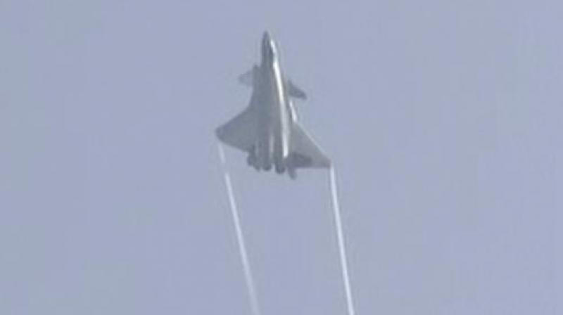The J-20 stealth fighter jet flies at the China's International Aviation and Aerospace Exhibition in Zhuhai on Tuesday. (Photo: AP) The J-20 stealth fighter jet flies at the China's International Aviation and Aerospace Exhibition in Zhuhai on Tuesday. (Photo: AP)
