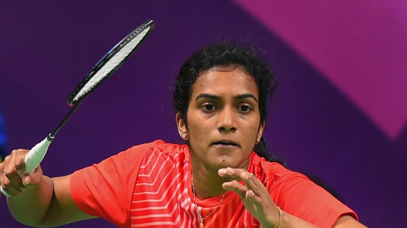 Indian badminton star P.V. Sindhu set her sights on reaching world number one after she shook off opening-match nerves to reach the last 16 at the Hong Kong Open on Wednesday. (Photo: PTI) Indian badminton star P.V. Sindhu set her sights on reaching world number one after she shook off opening-match nerves to reach the last 16 at the Hong Kong Open on Wednesday. (Photo: PTI)