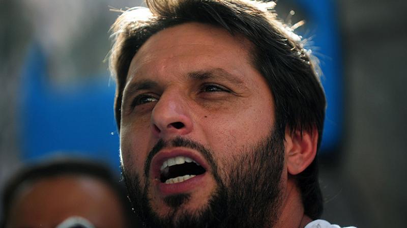 Former Pakistan cricketer Shahid Afridi on Wednesday urged both India and Pakistan to leave Kashmir and the Kashmiris decide their own future. (Photo: AP) Former Pakistan cricketer Shahid Afridi on Wednesday urged both India and Pakistan to leave Kashmir and the Kashmiris decide their own future. (Photo: AP)