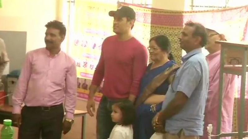 Mahendra Singh Dhoni casts his vote at a polling booth in Jawahar Vidya Mandir in Ranchi, Jharkhand. (Photo: ANI twitter) Mahendra Singh Dhoni casts his vote at a polling booth in Jawahar Vidya Mandir in Ranchi, Jharkhand. (Photo: ANI twitter)