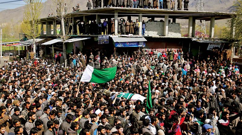 Villagers carry the body of of Umer Farooq, a Kashmiri civilian who was killed on Sunday, at Baroosa village on Monday. (Photo: AP) Villagers carry the body of of Umer Farooq, a Kashmiri civilian who was killed on Sunday, at Baroosa village on Monday. (Photo: AP)